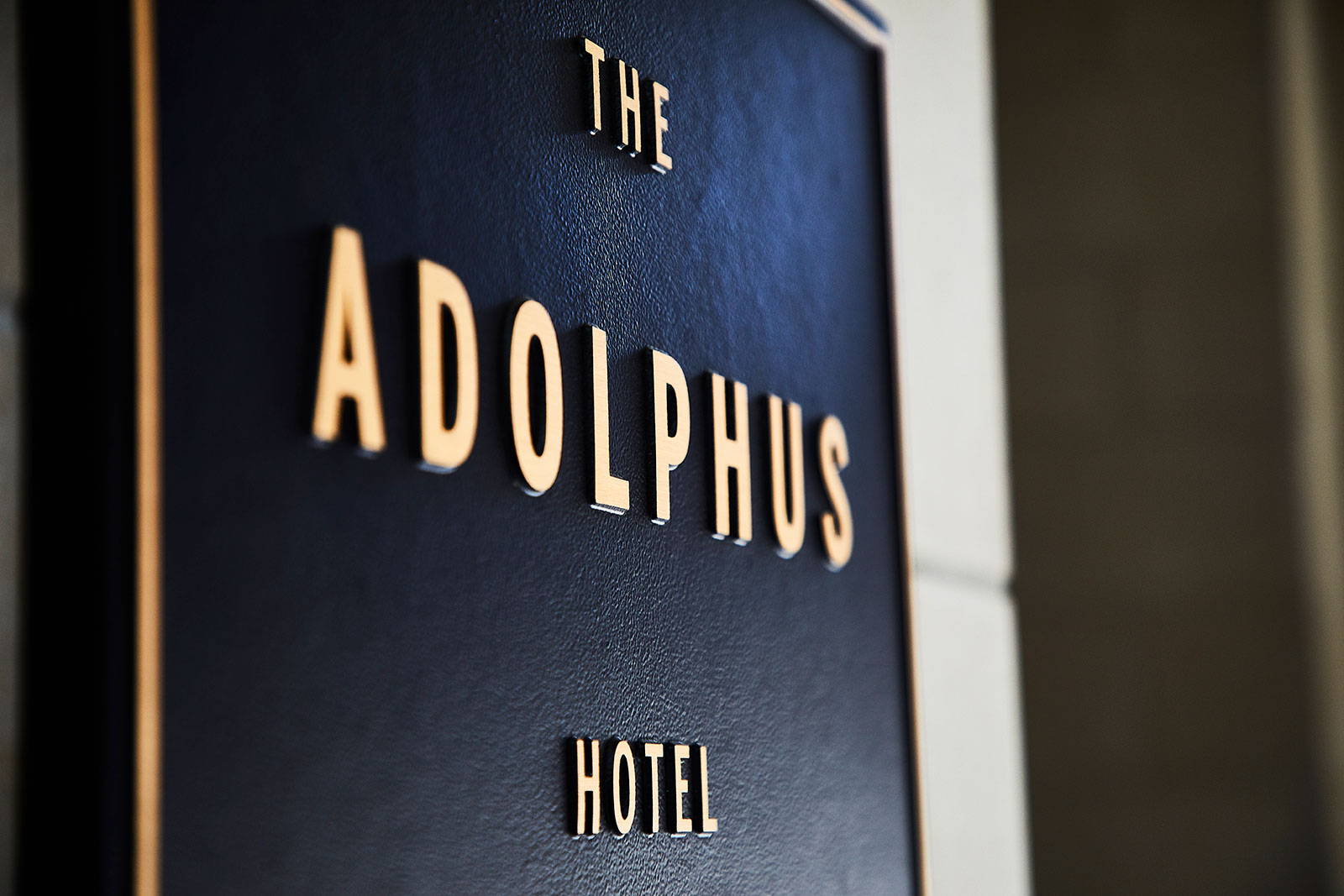 The Adolphus hotel sign
